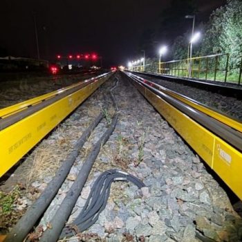 Woking Surveyed and Installed 350 metres of double PVC Con Rail Guard Boarding at 2 rail sidings walkways